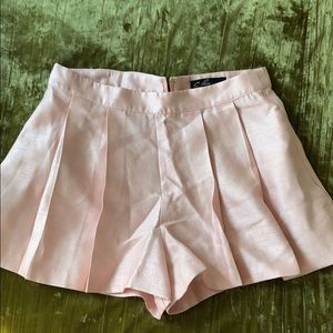 Pink pleated shorts